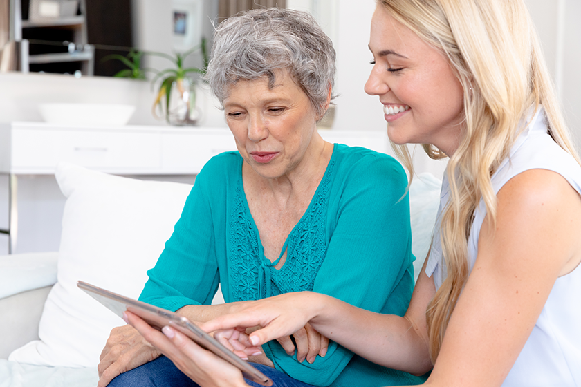 senior-caucasian-woman-wearing-green-shirt-her-adult-daughter